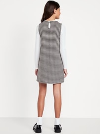 L'image numéro 2 présente Robe sans manches à poches en tricot jacquard pour fille