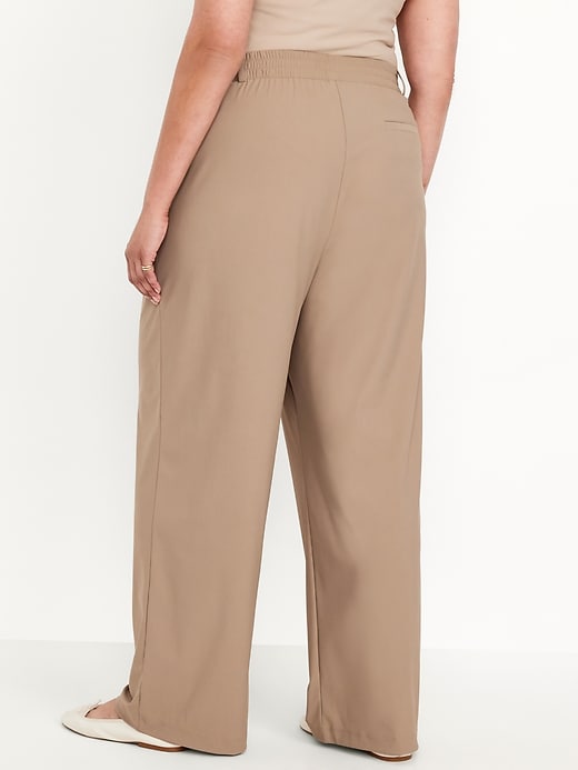 L'image numéro 7 présente Pantalon tailleur Tech élégant jambe large à taille haute