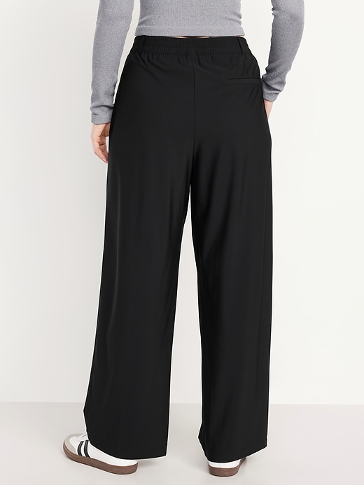 L'image numéro 3 présente Pantalon tailleur Tech élégant jambe large à taille haute