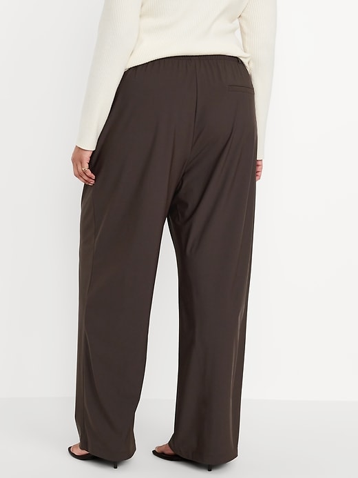 L'image numéro 7 présente Pantalon tailleur Tech élégant jambe large à taille haute