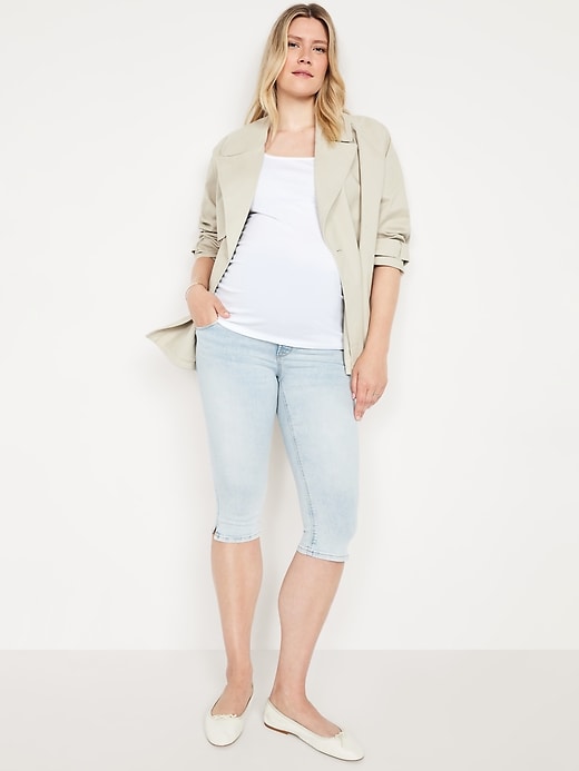 Image number 1 showing, Maternity Rollover-Panel Rockstar Slim Capri Jeans