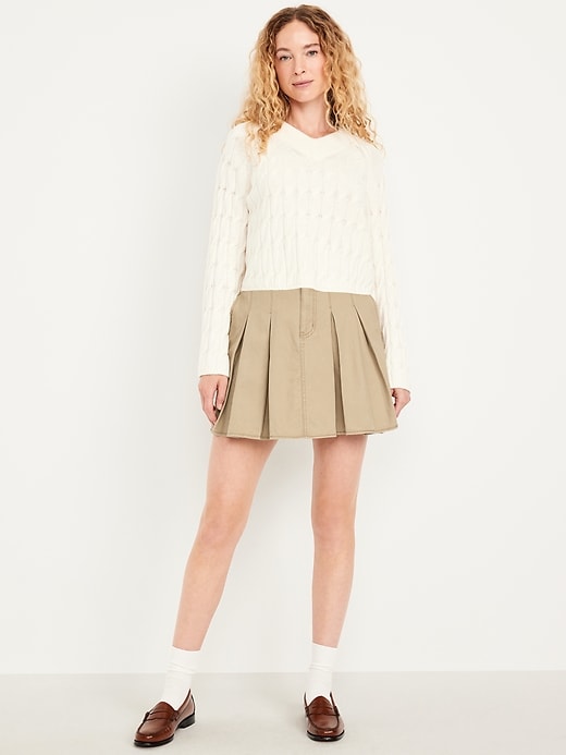 Image number 1 showing, High-Waisted Pleated Mini Skirt