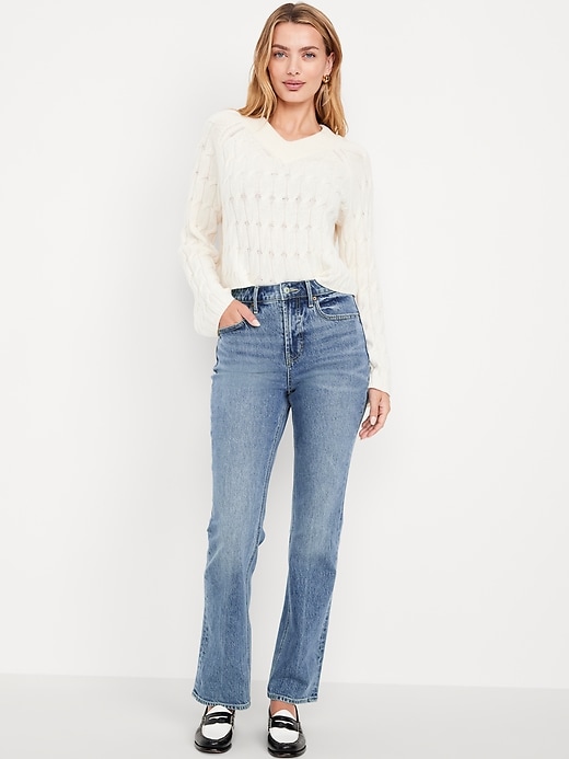 L'image numéro 1 présente Jean semi-évasé à taille très haute