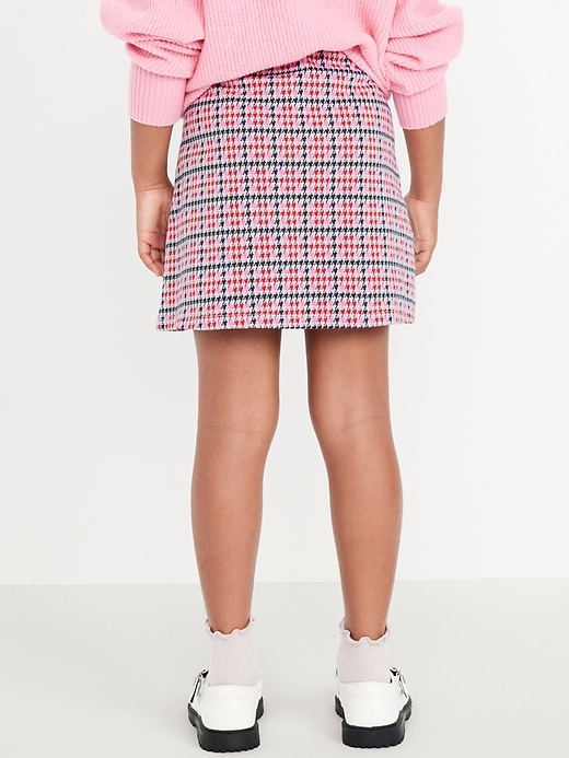 L'image numéro 2 présente Jupe-short de marin en tricot jacquard pour fille