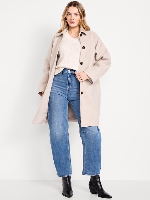 L'image numéro 1 présente Imperméable boutonné sur le devant