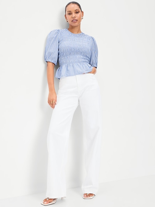 L'image numéro 3 présente Haut smocké à basque et à manches bouffantes