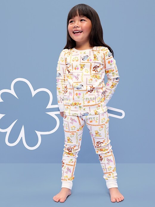 Image number 1 showing, Old Navy x Disney Winnie the Pooh Unisex Snug-Fit Pajama Set for Toddler & Baby