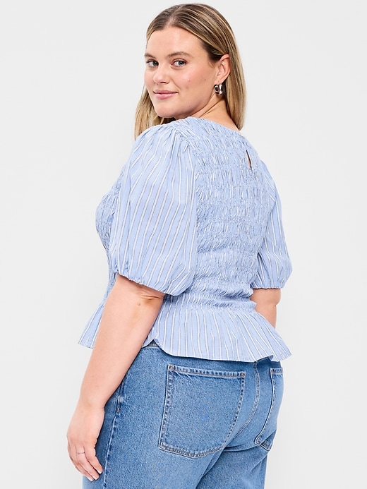 L'image numéro 8 présente Haut smocké à basque et à manches bouffantes