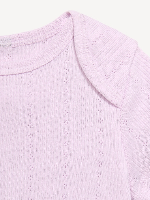 L'image numéro 2 présente Cache-couche à manches courtes en tricot pointelle pour bébé