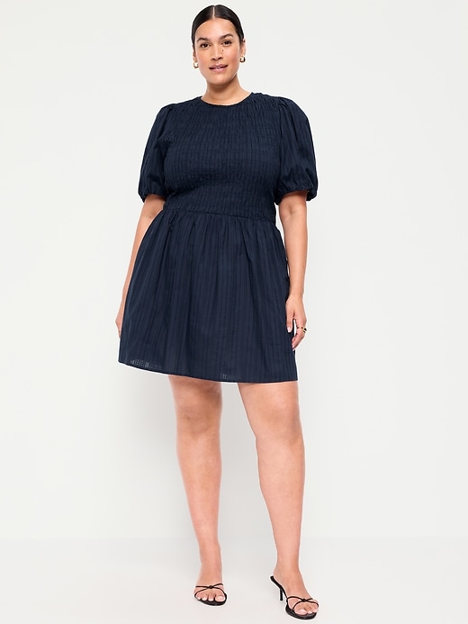 Image number 7 showing, Smocked Puff-Sleeve Flare Mini Dress