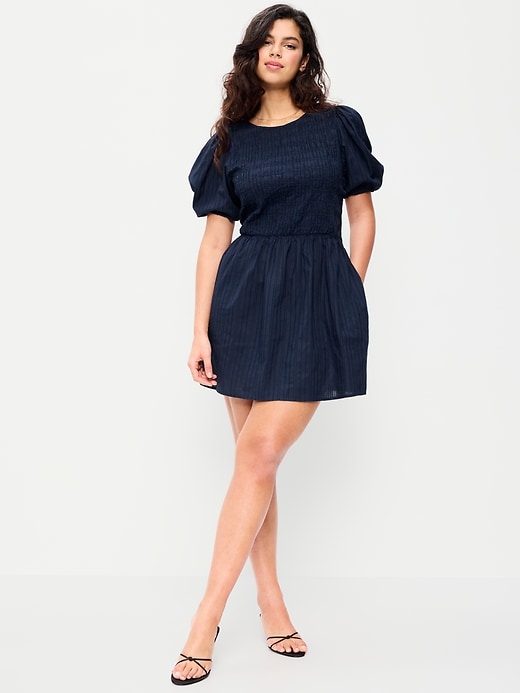 Image number 6 showing, Smocked Puff-Sleeve Flare Mini Dress