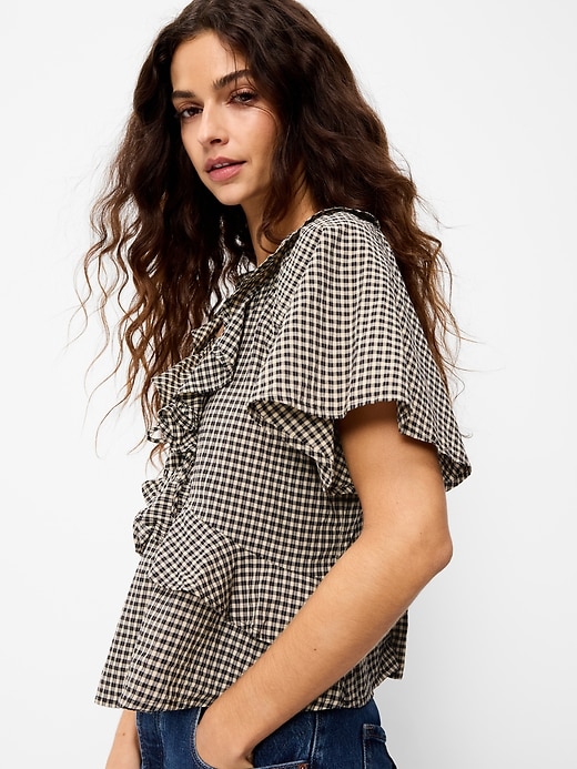 L'image numéro 4 présente Haut à volants noué à l’avant