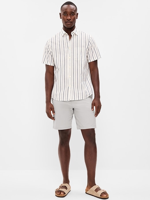 Image number 1 showing, Slim Built-In Flex Rotation Chino Shorts -- 8-inch inseam