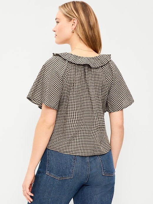 L'image numéro 6 présente Haut à volants noué à l’avant