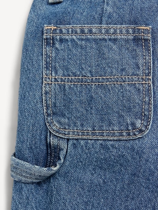 L'image numéro 5 présente Short menuisier utilitaire en denim coupe généreuse pour tout-petit