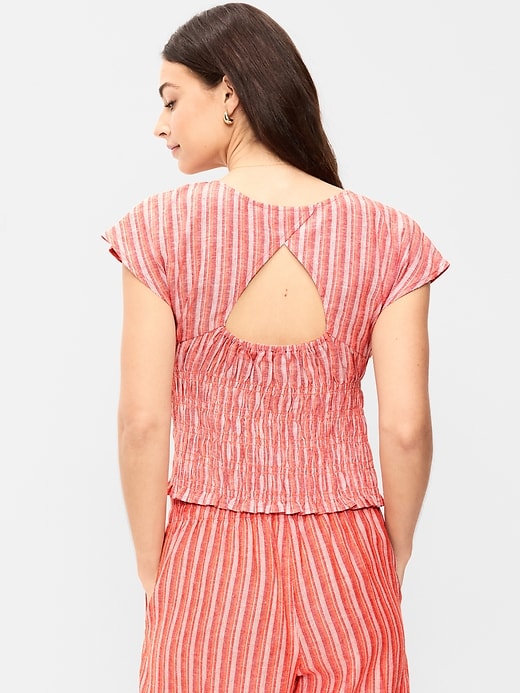 L'image numéro 2 présente Haut smocké à manches courtes en mélange de lin