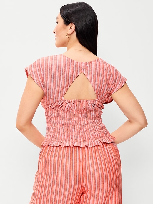 L'image numéro 5 présente Haut smocké à manches courtes en mélange de lin