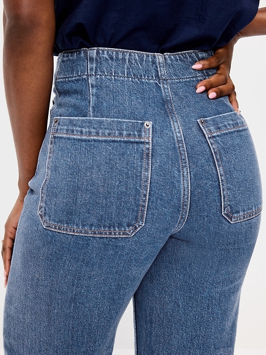 L'image numéro 5 présente Jean profilé à jambe large à revers et à taille très haute