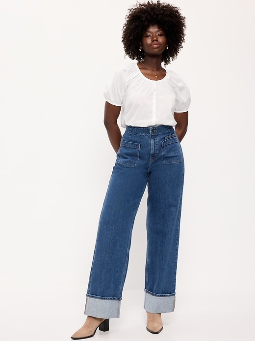 L'image numéro 6 présente Jean profilé à jambe large à revers et à taille très haute