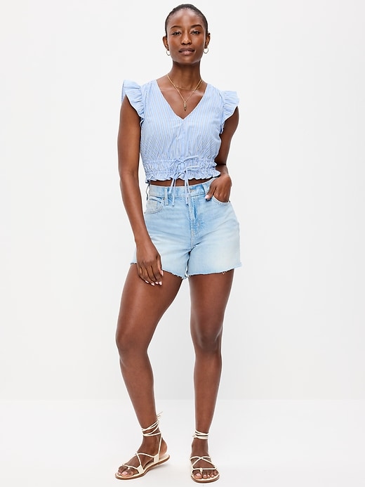 Image number 1 showing, Curvy High-Waisted Baggy Jean Cut-Off Shorts -- 5-inch inseam