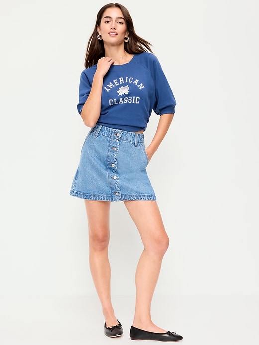 L'image numéro 1 présente Jupe courte boutonnée à bords festonnés