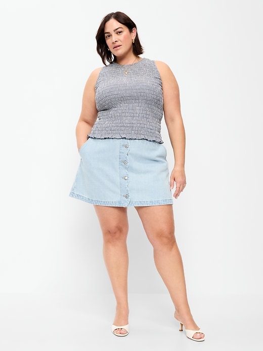 L'image numéro 9 présente Jupe courte boutonnée à bords festonnés