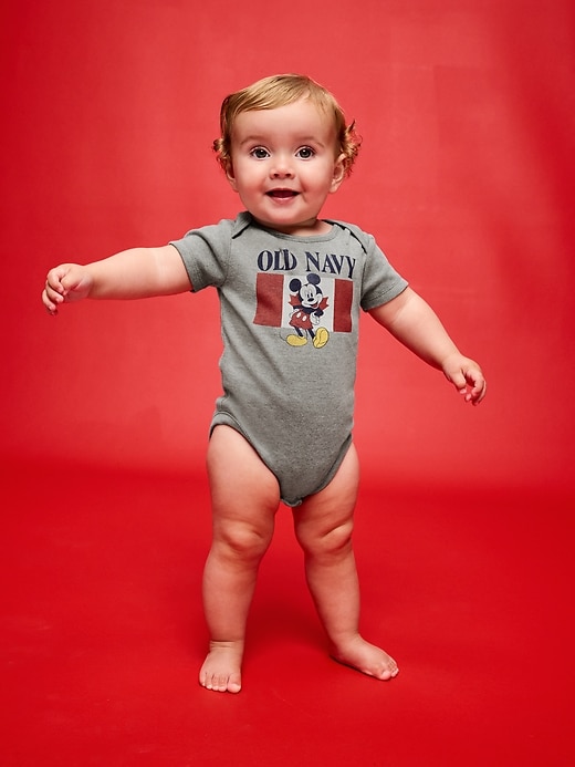 Image number 1 showing, Old Navy x Disney Mickey Mouse Short-Sleeve Unisex Graphic Bodysuit for Baby