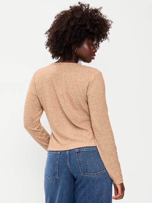 L'image numéro 4 présente Haut en tricot pointelle à manches longues boutonné sur le devant