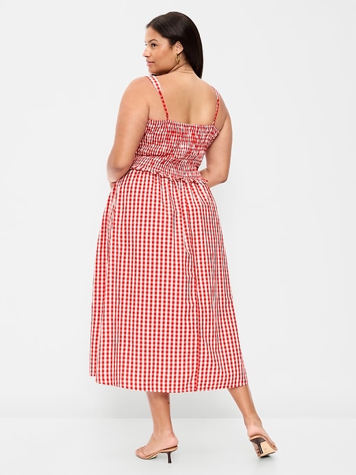 L'image numéro 10 présente Robe mi-longue ajustée et évasée à corsage smocké