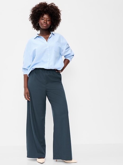 L'image numéro 6 présente Pantalon tailleur coupe généreuse à jambe large et taille haute