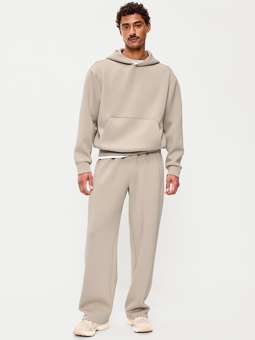 L'image numéro 1 présente Pantalon en coton ouaté coupe généreuse en molleton raffiné