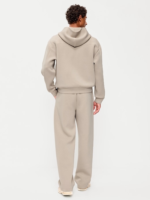 L'image numéro 3 présente Pantalon en coton ouaté coupe généreuse en molleton raffiné