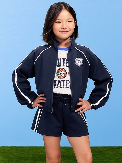 L'image numéro 1 présente Veste à glissière en Molleton dynamique à imprimé de soccer pour fille