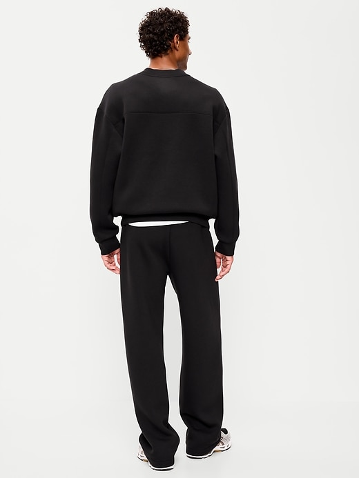 L'image numéro 3 présente Pantalon en coton ouaté coupe généreuse en molleton raffiné