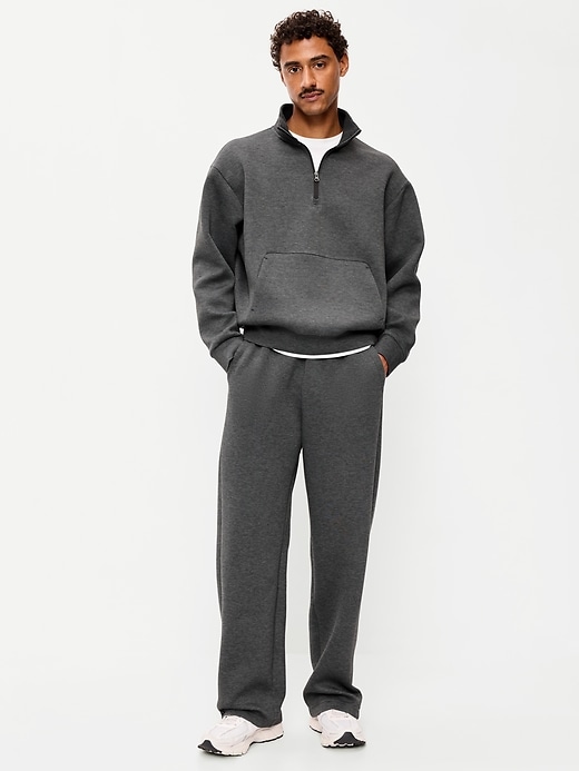 L'image numéro 1 présente Pantalon en coton ouaté coupe généreuse en molleton raffiné
