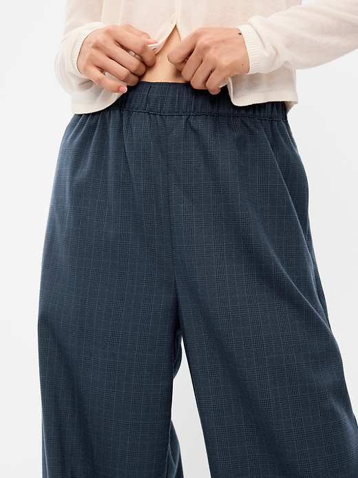 L'image numéro 5 présente Pantalon tailleur coupe généreuse à jambe large et taille haute