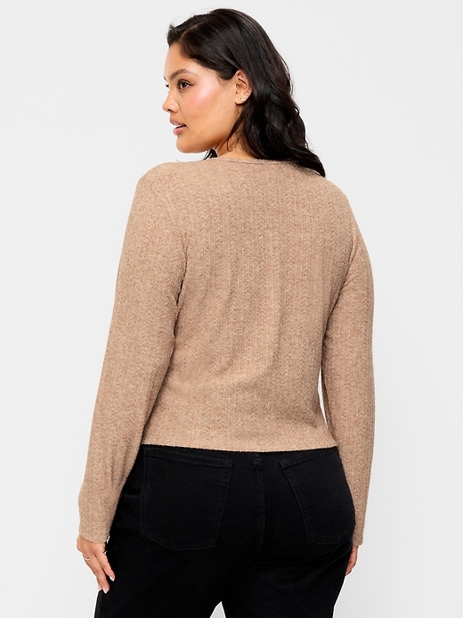 L'image numéro 6 présente Haut en tricot pointelle à manches longues boutonné sur le devant
