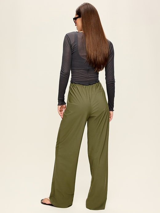 L'image numéro 3 présente Pantalon tailleur Tech Élégant à taille haute