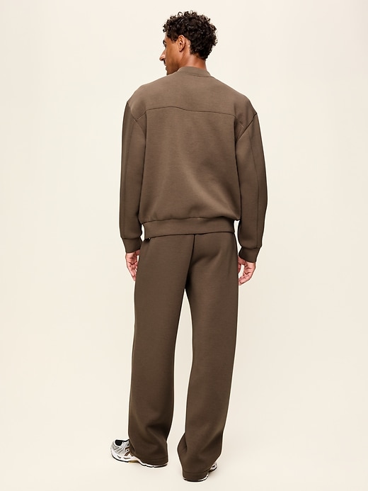 L'image numéro 3 présente Pantalon en coton ouaté coupe généreuse en molleton raffiné