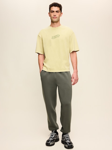 PANTALON DE JOGGING COUPE GÉNÉREUSE EN MOLLETON RAFFINÉ